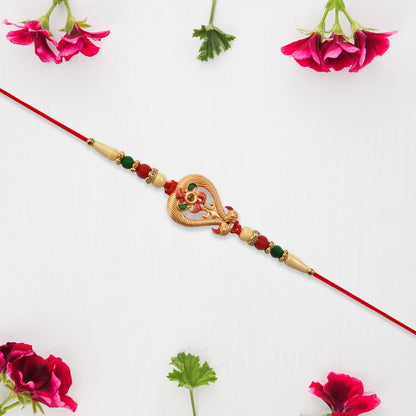 Designer Rakhi With Veena And Flower Charm